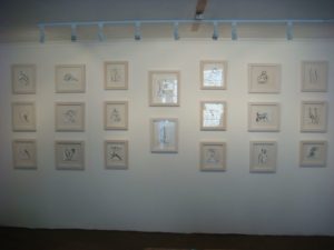 installation of small framed drawings