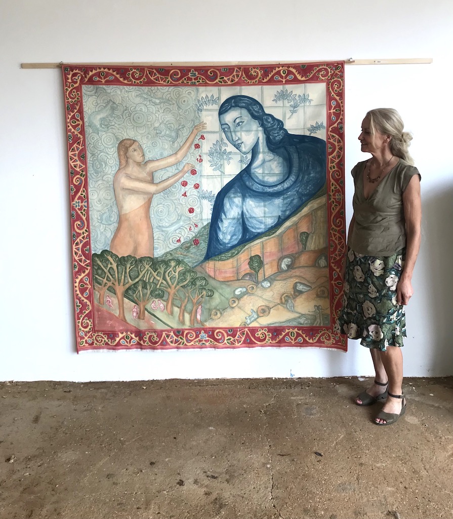 artist Delpha Hudson with her finished painting Portuguese art residency